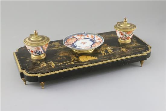 A French Louis XIV style ormolu mounted black lacquered ink stand, 14.25in.